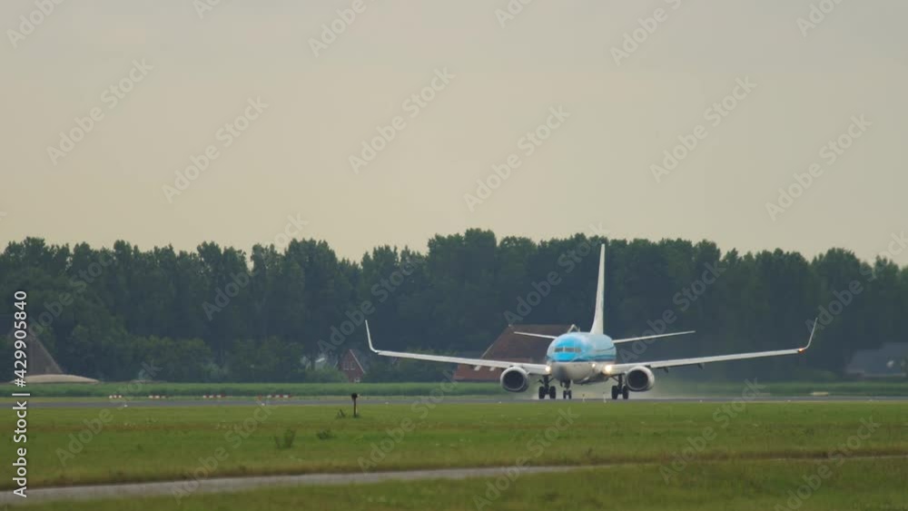 Jet airplane departed from Amsterdam airport Jet airplane departed from Amsterdam airport