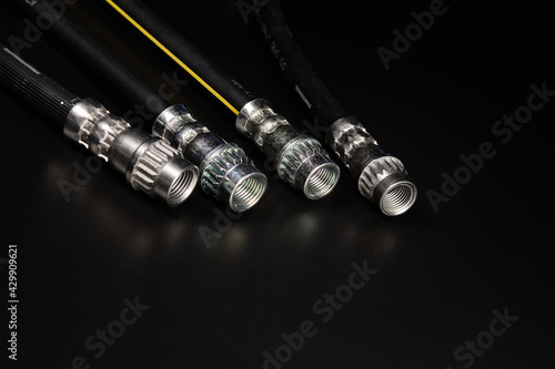 Brake Hoses on black background.