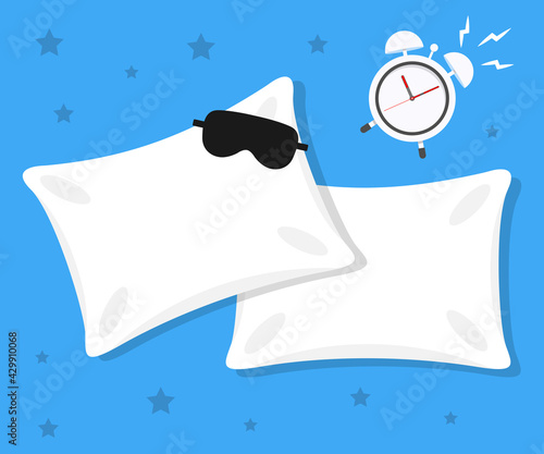 White Pillow on Blue Background Relaxation, sleeping concept pillow with blindfold on it