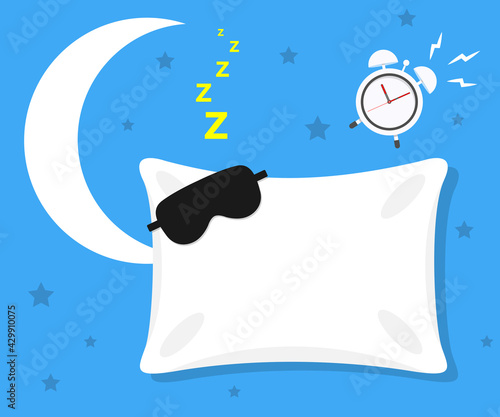 White Pillow on Blue Background Relaxation, sleeping concept pillow with blindfold on it