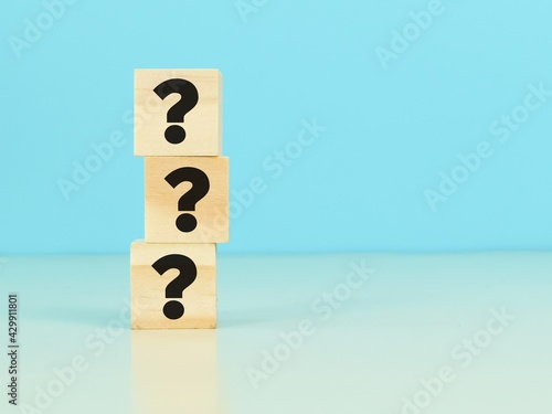 Question mark concept. Wooden cubes with question mark symbol.