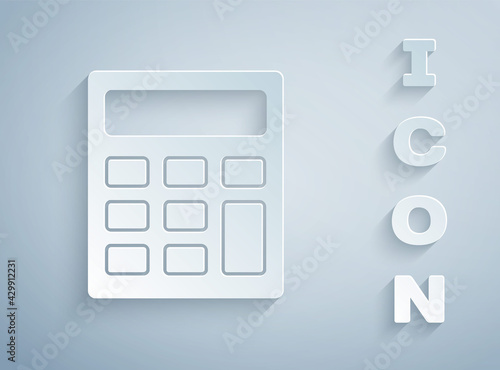 Paper cut Calculator icon isolated on grey background. Accounting symbol. Business calculations mathematics education and finance. Paper art style. Vector