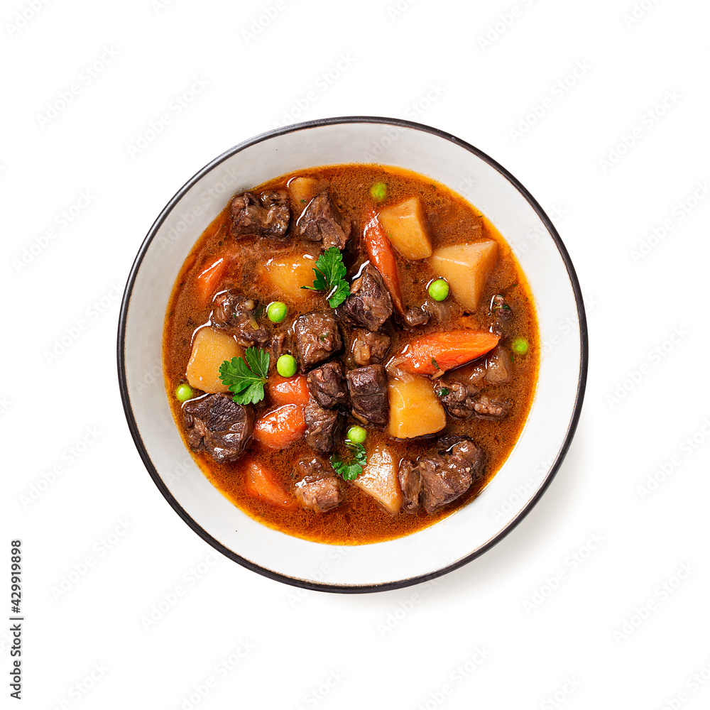 Irish stew made with beef, potatoes, carrots and herbs. Traditional St patrick's day dish. isolated on white background, top view. Irish stew made with beef, potatoes, carrots and herbs. Traditional St patrick's day dish. isolated on white background, top view.
