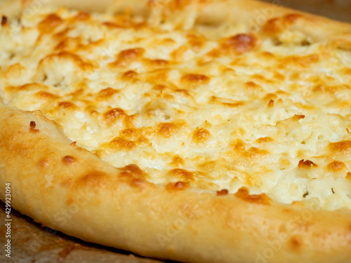 close-up of delicious ready-made khachapuri. Side view