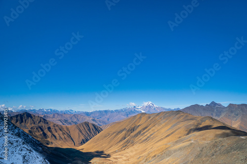 mountain hiking landscape in Juta trekking area landscape in autumn - popular trekking in the Caucasus mountains  Kazbegi region  Georgia.