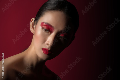 Red eye shadow colour makeup beauty
 photo