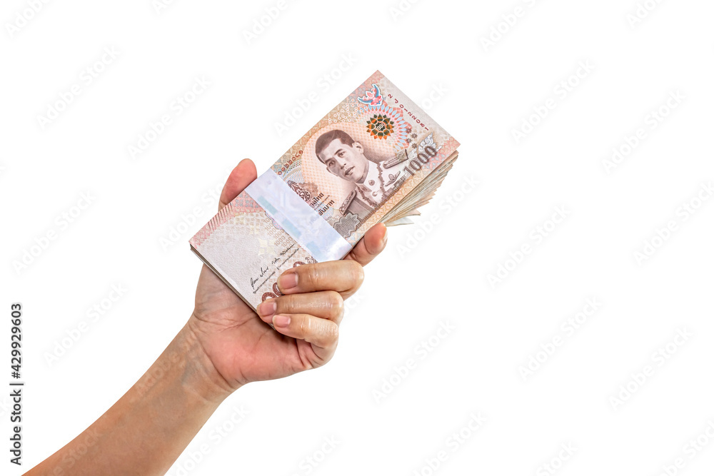 money cash in hand are holding, rich wealthy concept, wad of banknote money thai baht, hand and money many isolated on white, copy space money cash in hand are holding, rich wealthy concept, wad of banknote money thai baht, hand and money many isolated on white, copy space