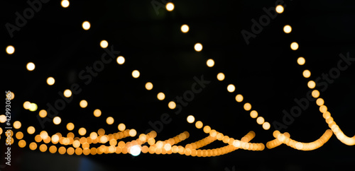 blur decorative lights bokeh colorful for background, decorative string lights outdoor at night time