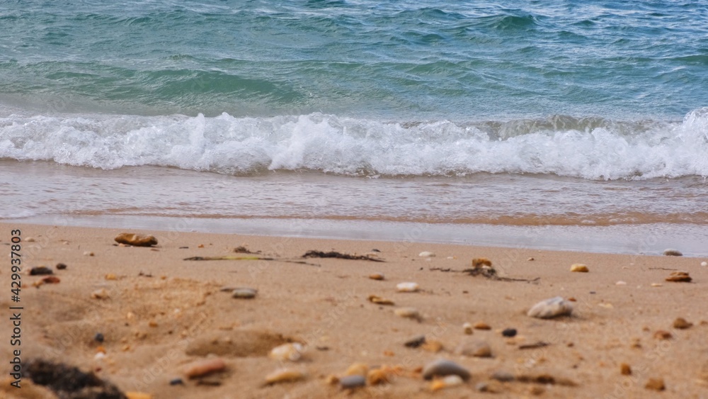 Image of a crashing wave on the blue sea. Image of a crashing wave on the blue sea.