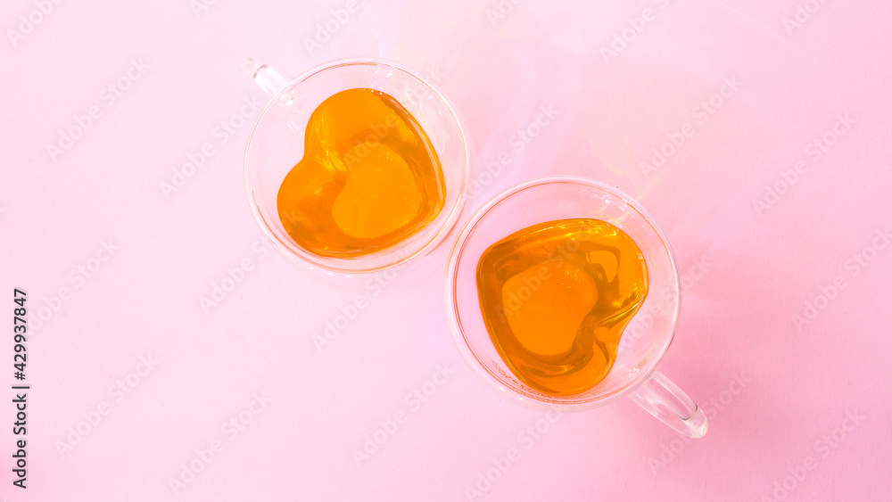 Two cups of tea. Heart shaped cup Two cups of tea. Heart shaped cup