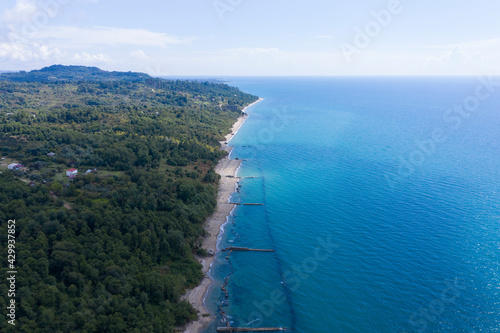 The Black Sea coast from the height of the flight. Aerovideo. New Athos, Abkhazia, Georgia. photo