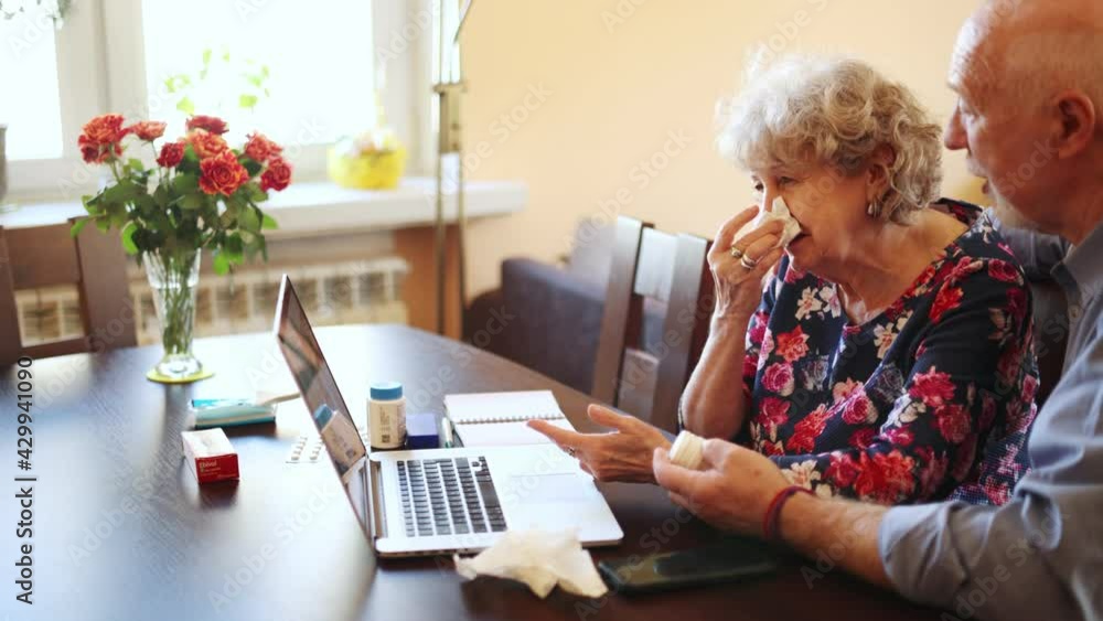 Senior couple consulting with a doctor on laptop at home
Senior couple consulting with a doctor on laptop at home