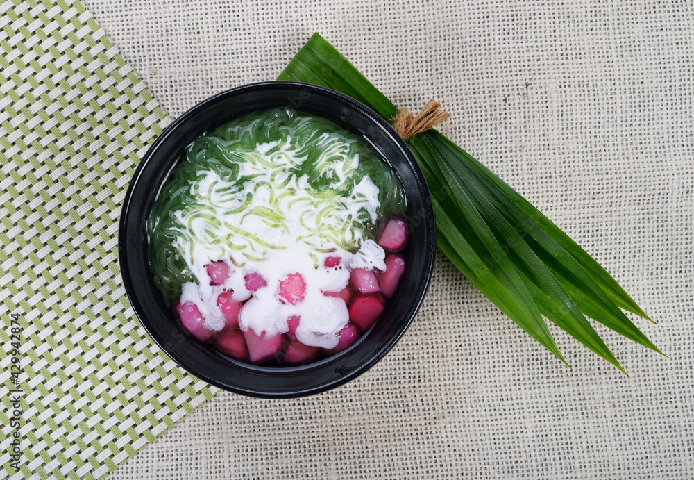 Thai dessert. Water Chestnuts in Coconut Milk. Tub Tim Grob. foto de Stock Adobe Stock