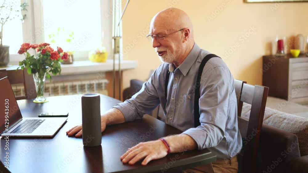 Senior man using Virtual Assistant at home
Senior man using Virtual Assistant at home