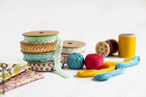 Sewing accessories isolated on white background.