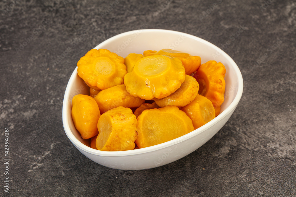 Marinated yellow patisson in the bowl Marinated yellow patisson in the bowl