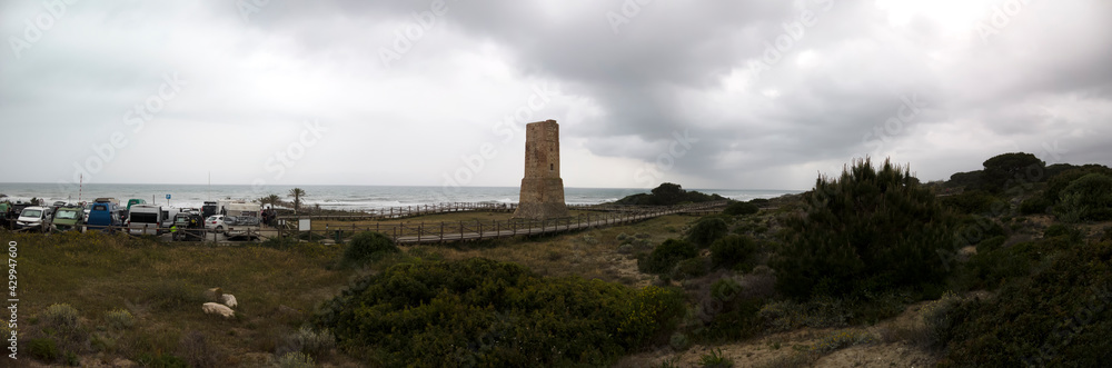 Antigua torre vigía llamada de torreladrones en las dunas de Artola, Marbella