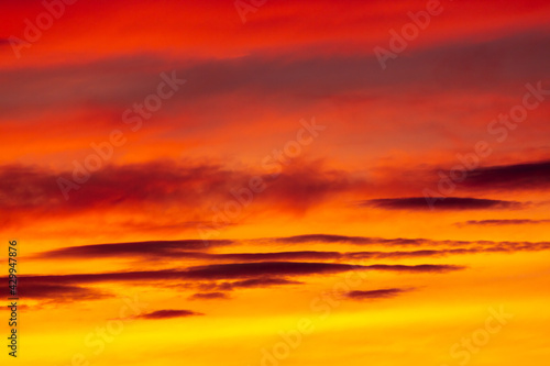 Colorful sunset with clouds in the sky.