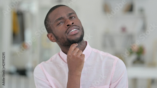 Portrait of Pensive African Man Thinking New Plan