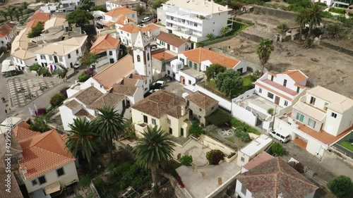 Flying towards old house of Christopher Columbus in Vila Baleira, aerial photo