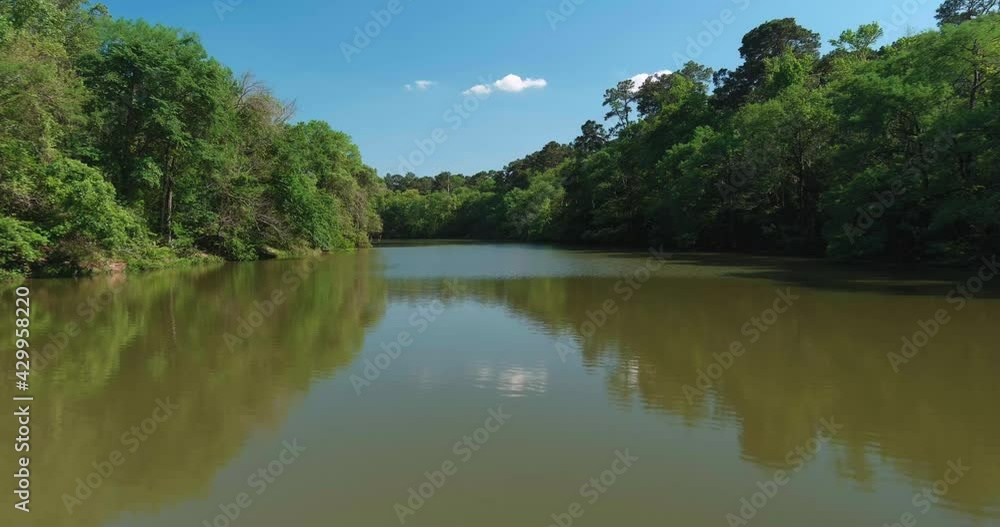 4k aerial of large lake in Houston located near the Lake Houston dam 4k aerial of large lake in Houston located near the Lake Houston dam