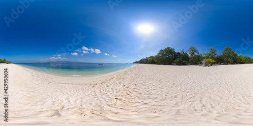 Fototapeta Naklejka Na Ścianę i Meble -  Tropical landscape with a beautiful beach in the blue water and Great Santa Cruz island. Zamboanga, Mindanao, Philippines.