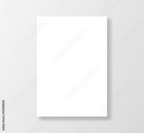 Blank white paper design template. White poster mockup isolated on gray background.