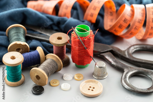 Threads, needles and sewing items.