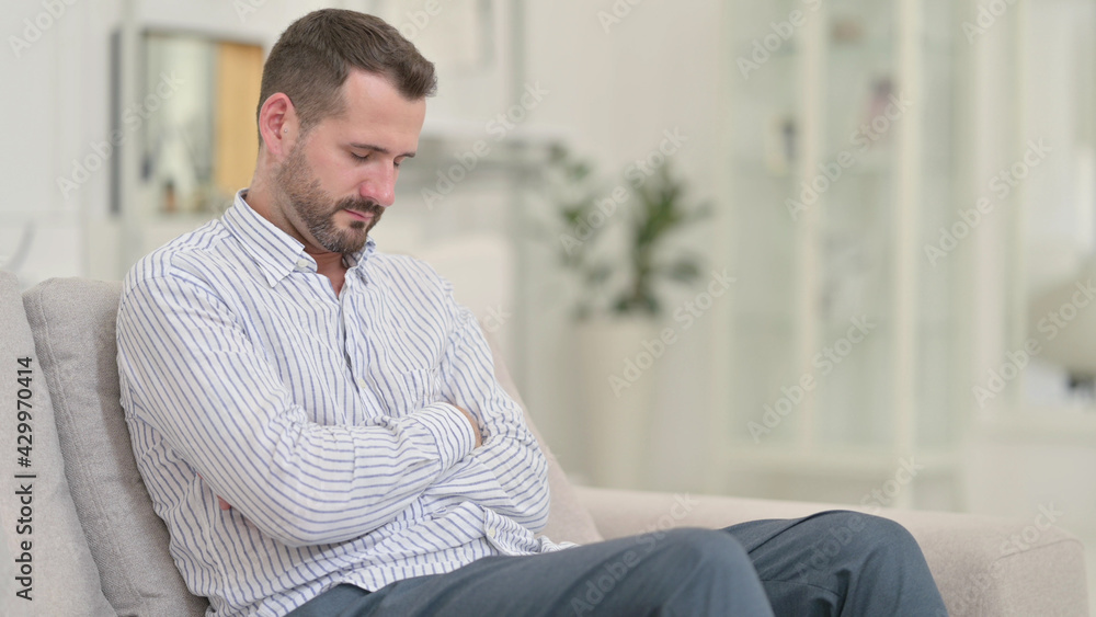 Exhausted Young Man Taking Nap on Sofa at Home Exhausted Young Man Taking Nap on Sofa at Home
