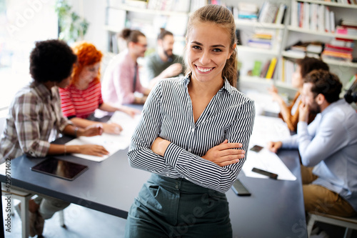 Collaboration and analysis by business people working in office
