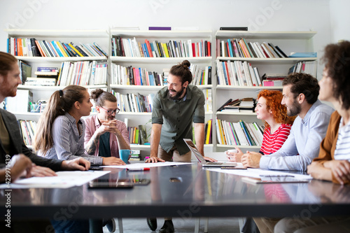 Collaboration and analysis by business people working in office