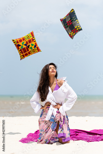 portrait of a happy woman enjoying at the beach
