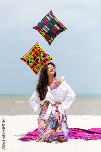 portrait of a happy woman enjoying at the beach