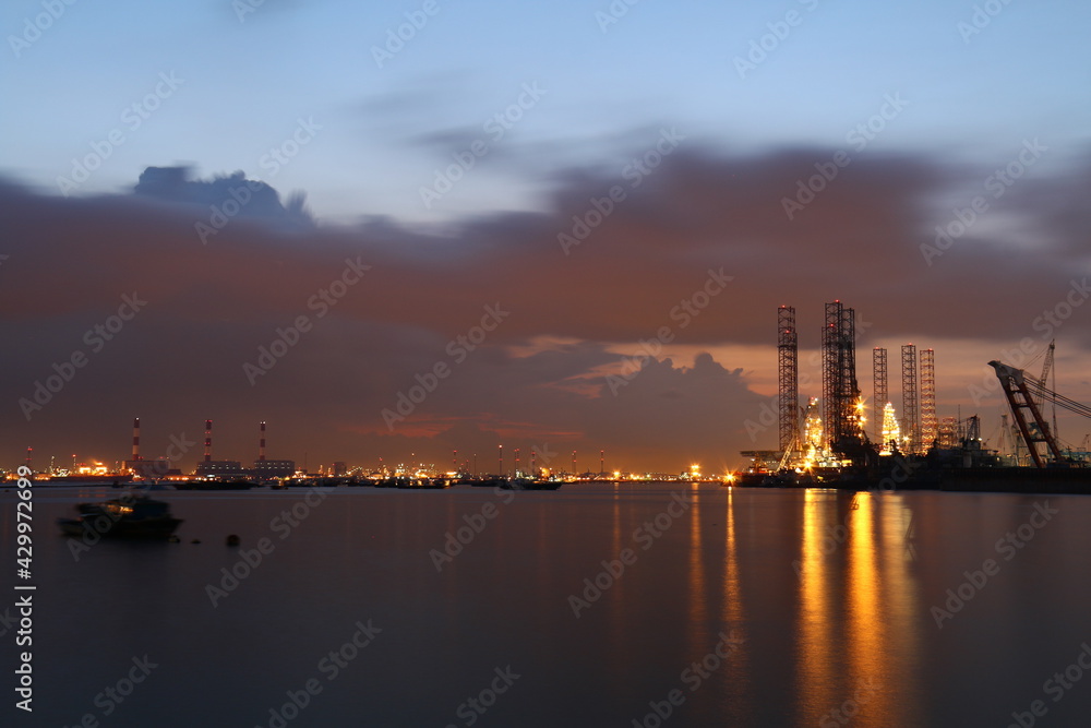 oil refinery at sunset, port, sea industry, sunset, clouds, water, sea view, evening sunset, night view, sea at night, 