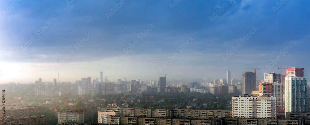 Dawn clouds over the metropolis of early sunset Dawn clouds over the metropolis of early sunset