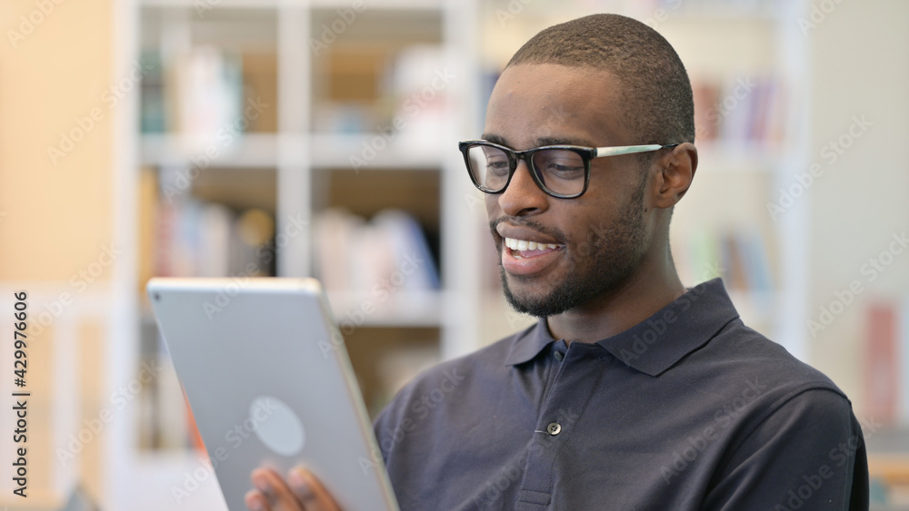 Portrait of Video Chat on Tablet by African Man Portrait of Video Chat on Tablet by African Man