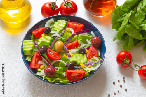 Mediterranean salad. It contains plenty of olive oil and vinegar water. It's a great salad for dieters. A widely consumed salad for a healthy diet.