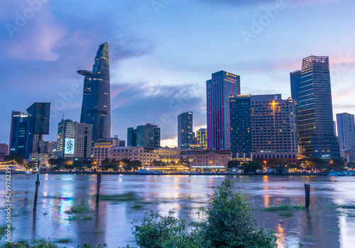 Bitexco Financial Tower building  buildings  roads and Saigon river in Ho Chi Minh city - This city is a popular tourist destination of Vietnam. Business and landscape concept.
