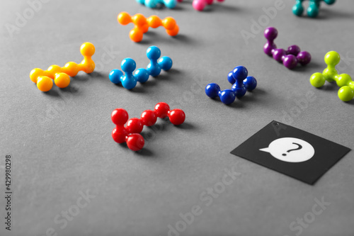 Multicolored game on grey background