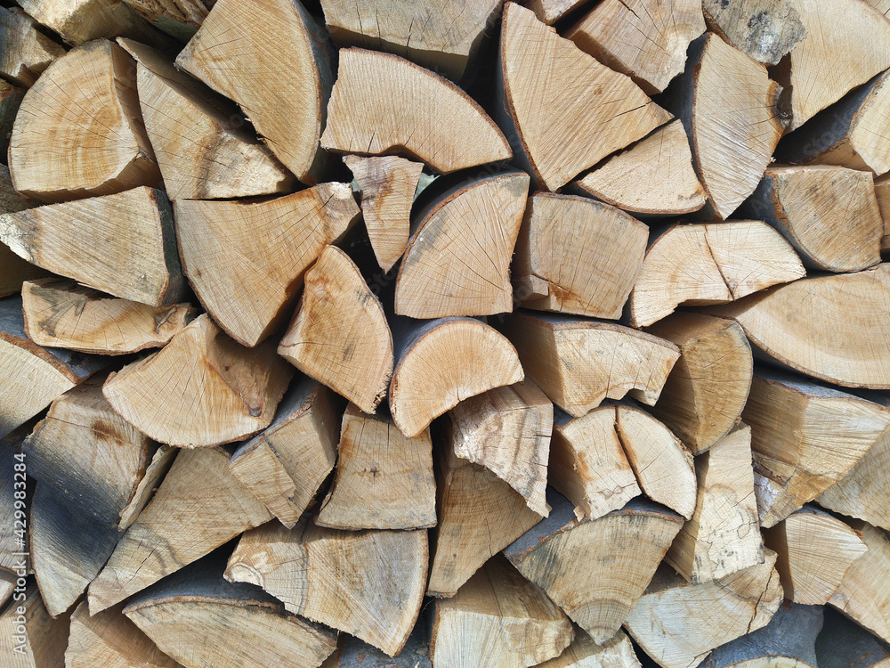 The texture of the wall is chopped firewood, which is laid out very carefully. Firewood harvesting The texture of the wall is chopped firewood, which is laid out very carefully. Firewood harvesting