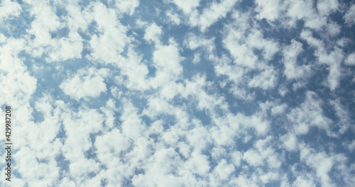 Environment concept: Small airy clouds on blue sky © Patrick Daxenbichler