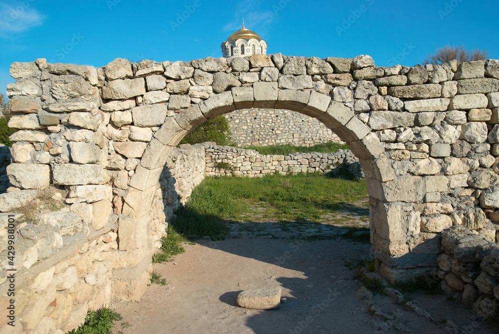 Exit in ancient wall, stone old door, arc
