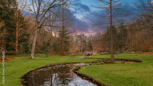 Meandering waterway through Leonard J. Buck Public Garden in Far Hills New Jersey on on early spring day