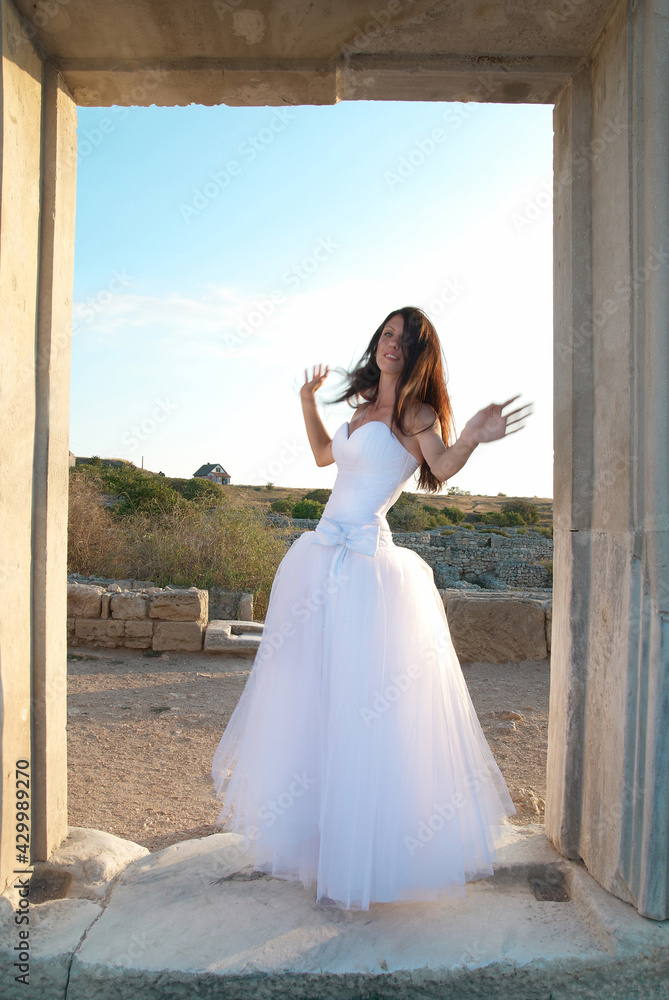Beautiful bride in white wedding dress