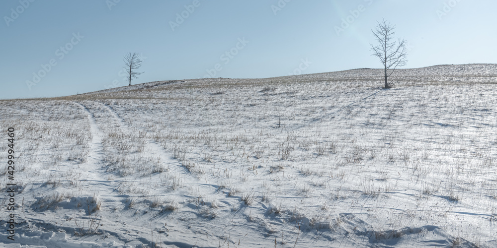 Snow-covered road on the island of Olkhon Snow-covered road on the island of Olkhon