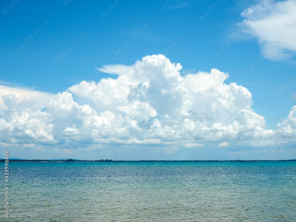 Beautiful blue sea Against the sky and white clouds. Beautiful blue sea Against the sky and white clouds.
