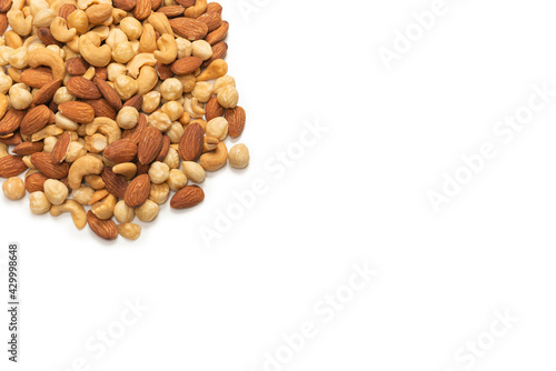 Mix of nuts isolated on white background. Top view.