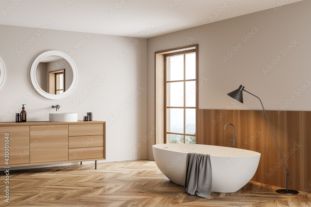 Light bathroom interior with sink and bathtub with lamp on wooden floor - obrazy, fototapety, plakaty 