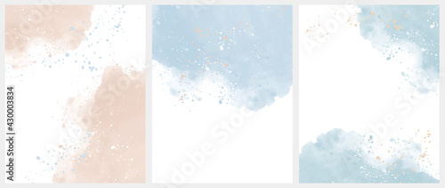 Set of 3 Delicate Abstract Watercolor Style Vector Layouts. Light Beige and Blue Paint Stains on a White Background. Pastel Color Stains and Splatter Print Set. © Magdalena