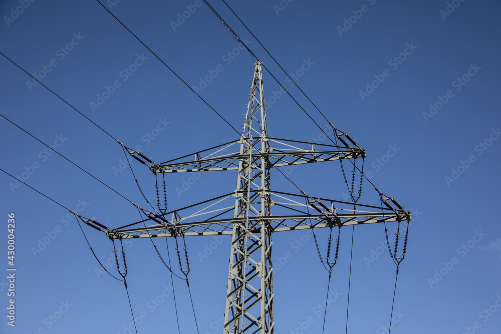 Steel mast with power lines